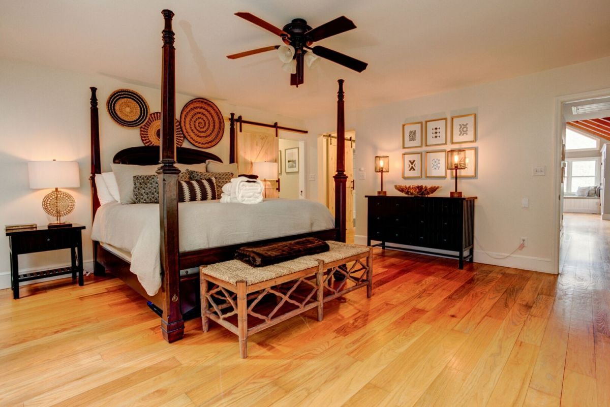 Primary suite with four-poster bed